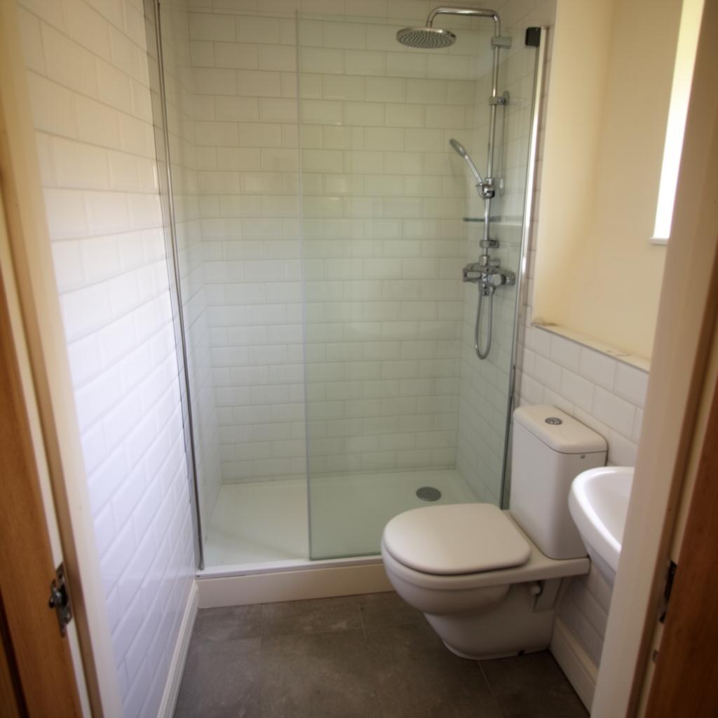 Metro tile shower room in Bournemouth